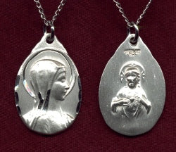 Blessed Mother Sterling Medal measures 7/8" tall, your Choice of Chain # 4576